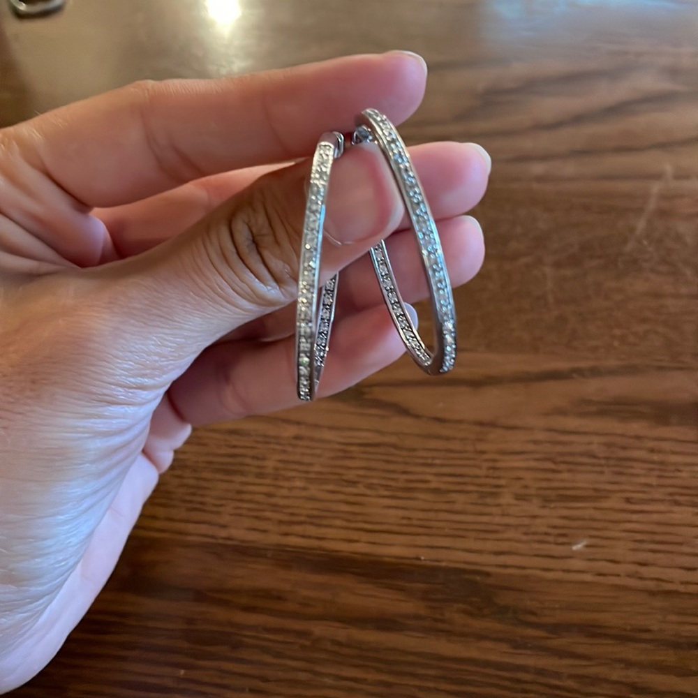 Silver hoop earrings with gems